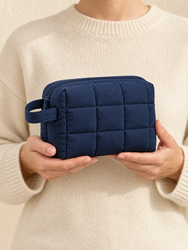 Boxy Wash Pouch in Ink Navy, shown worn or carried to show its size