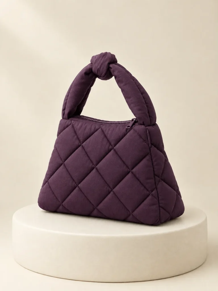 Knot Handle Puff in Plum, back and side view