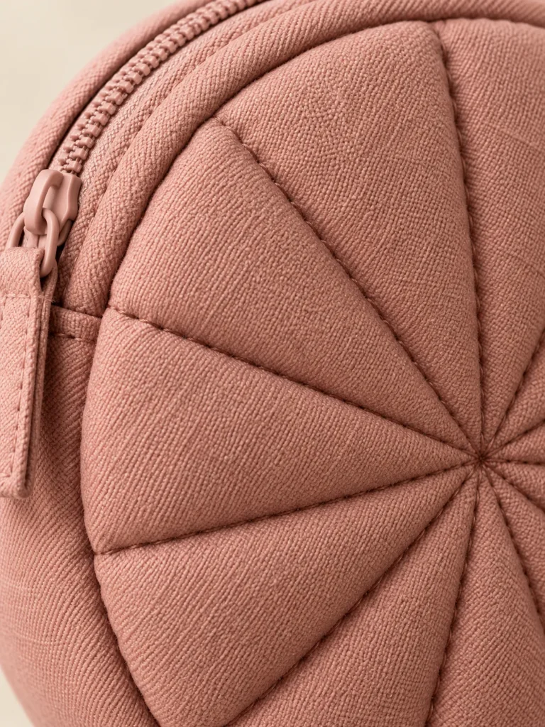 Close-up of the quilting and closure on the Round Coin Puff