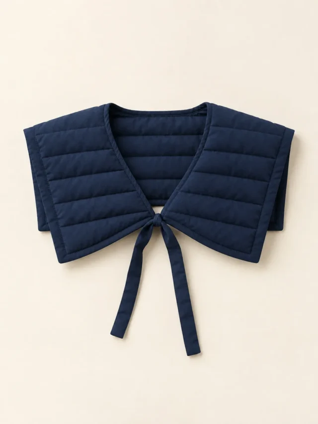 Sailor Channel Collar in Ink Navy, front view on a cream plinth