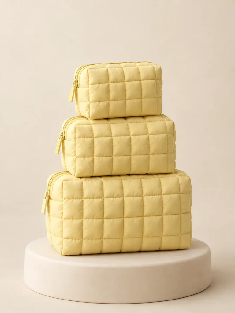 Trio Stack Set in Butter, front view on a cream plinth