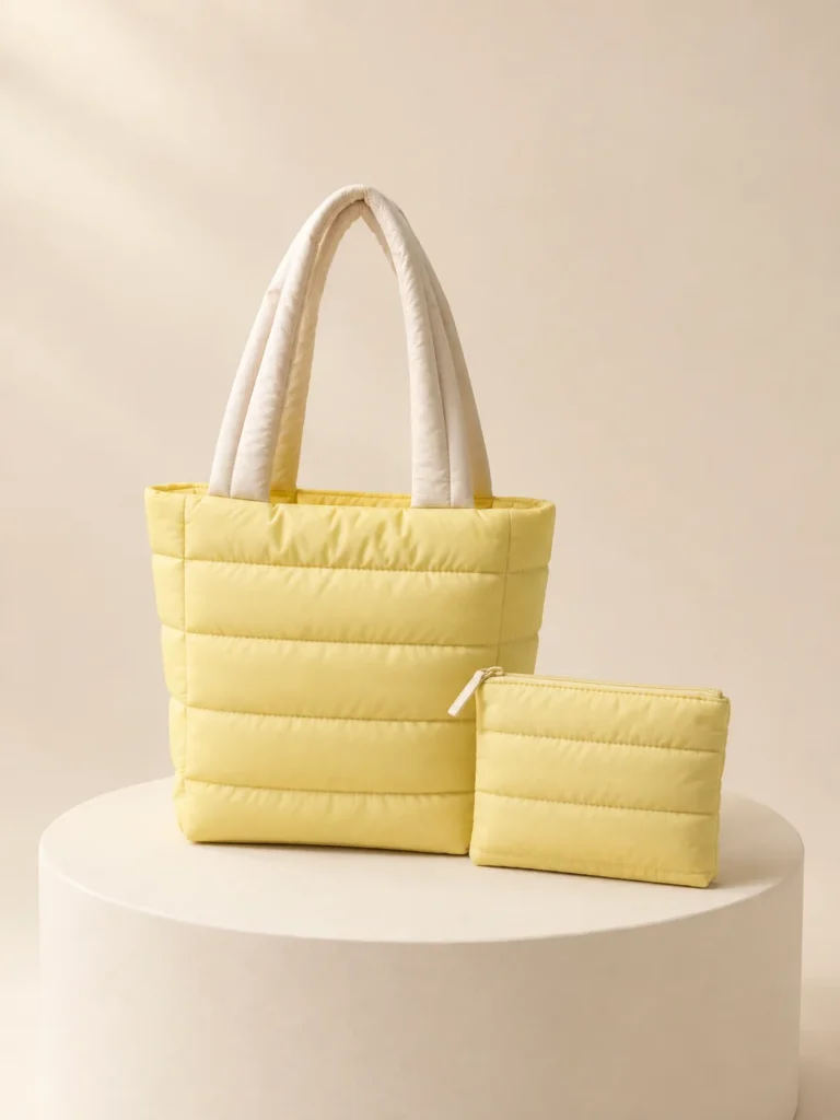 Wrap Handle Tote Set in Butter & Cream, front view on a cream plinth